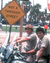 Chips Erik Estrada and Larry Wilcox on Bikes by street sign 16x20 Poster - £15.84 GBP