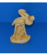 Figurines/Trinkets-Stork Figurine with Baby-Resin Material - Unmarked - $21.60