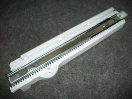 5098JJ1002A KENMORE LG REFRIGERATOR FREEZER DOOR RAIL GLIDE LEFT SIDE - $60.00