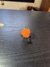 Baby Pumpkin Monster Voodoo String Doll charm, keychain Halloween - $14.95