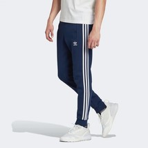 NWT men&#39;s medium Adidas Originals trefoil superstar Track Pant jogger IB... - $56.99