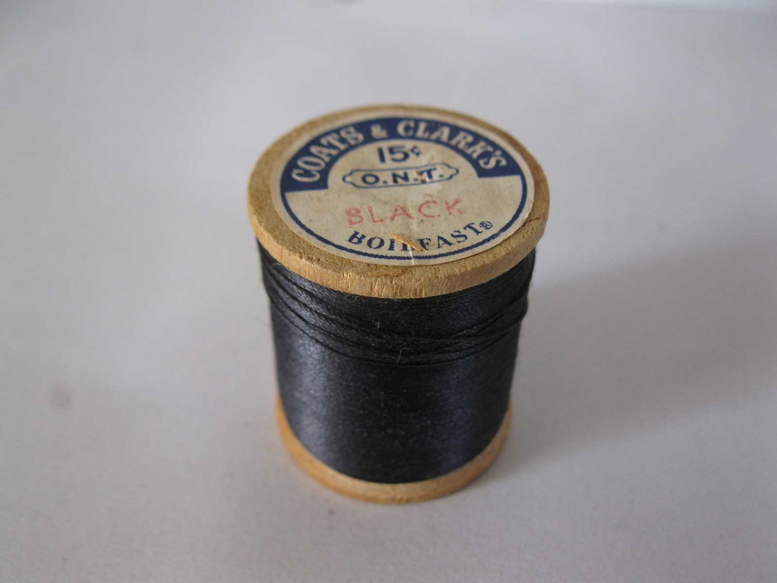 #21 old wood Spool w/ Thread: Coat's & Clark's Boilfast - Black - $2.00