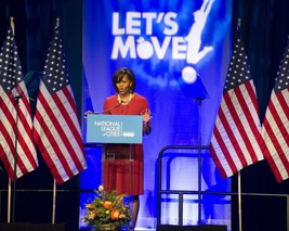 First Lady Michelle Obama speaks to National League of Cities Photo Print - £7.18 GBP