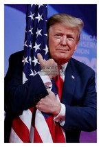 President Donald Trump Hugging American Flag 4X6 Photo - £6.34 GBP