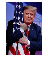PRESIDENT DONALD TRUMP HUGGING AMERICAN FLAG 4X6 PHOTO - £6.26 GBP