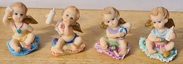 Cherub Baby Angel Bottle Heart Cute Figurine Set Of 4 Different - £14.00 GBP