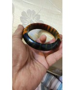 Unique vintage bakelite end of day bowtie gumdot bangle bracelet  - $299.00