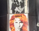 LOT OF 2: THE DOORS GREATEST HITS +THE DOORS ORIGINAL SOUNDTRACK [USED] CD - $7.91