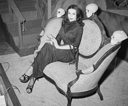 Vampira Classic Seated On Couch With Skulls Looking At Her! 16x20 Canvas Giclee - $69.99