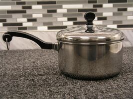 FARBERWARE Aluminum Clad Stainless Steel 2 Quart Sauce Pan with Lid. - $20.00