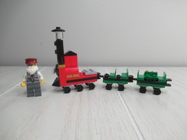 Lego Minifigure train conductor + mini train pieces - £7.77 GBP