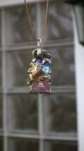 Bismuth pendant with silverplated bail, bismuth crystal - $390.29 MXN