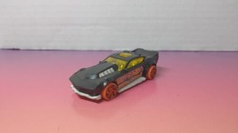 2016 Hot Wheels DTY12 Black 2 3/4&quot; Diecast Car W/ Orange Wheels &amp; Yellow Windows - $2.57