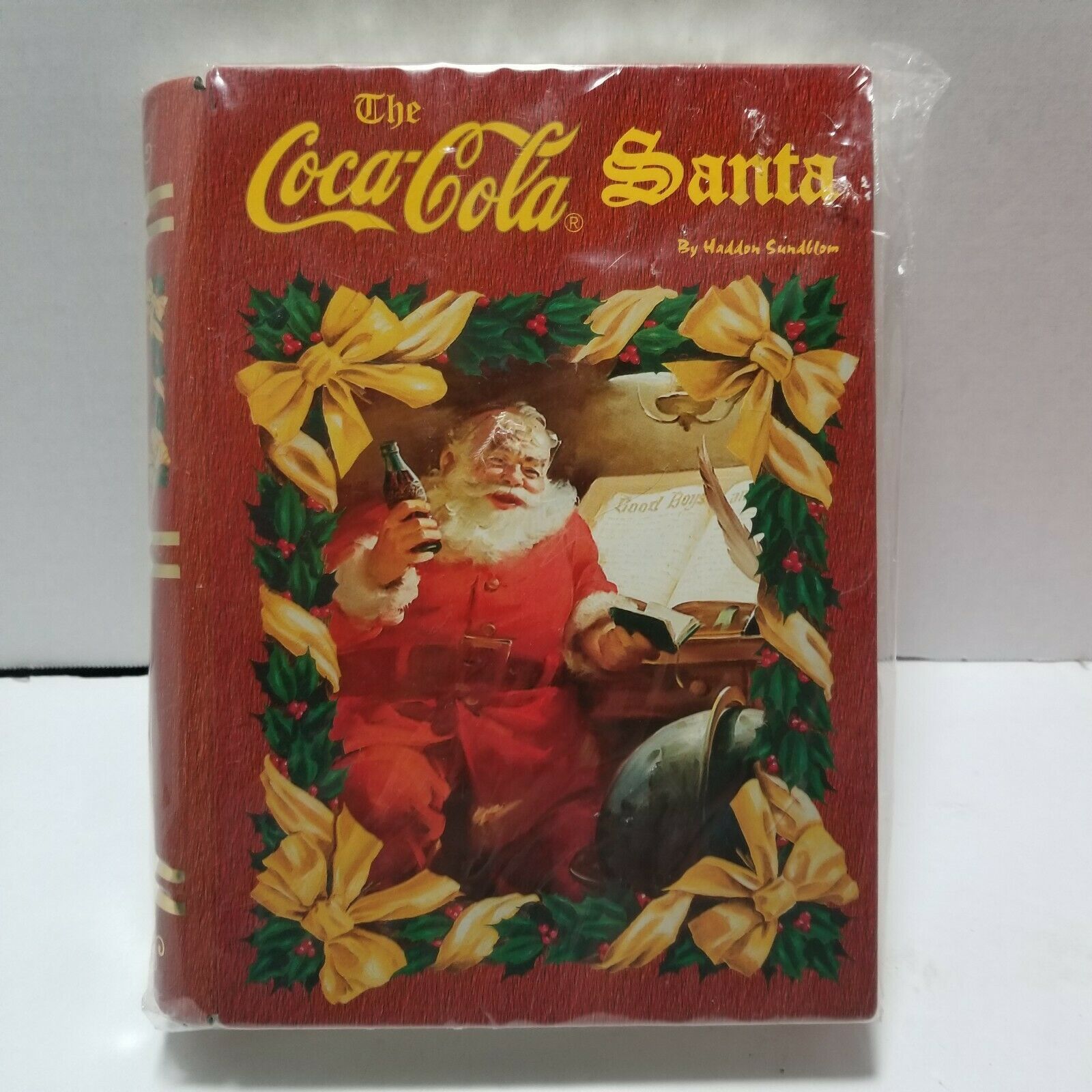 Primary image for Coca-Cola Santa Haddon Sundblom Holiday Tin Book Safe Stash Box