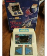 Vintage Radio Shack Space Alien Hand Held LCD Electronic Arcade Game &amp;Bo... - $952.79 MXN