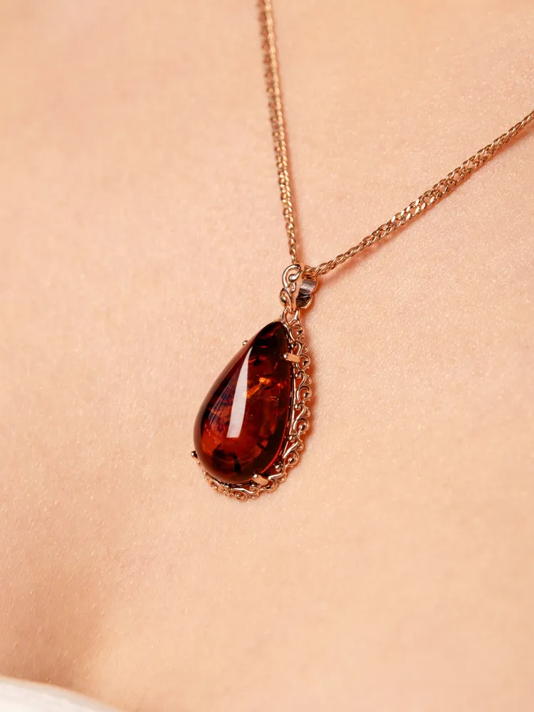Jewelry pendant with natural Baltic amber made of 925 silver - $133.14 CAD