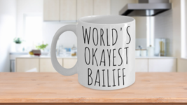 Worlds Okayest Bailiff Mug Funny Gift Court Official Work Birthday Dad Husband - £14.98 GBP