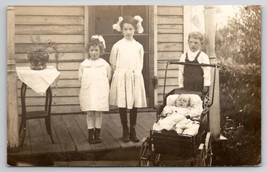 RPPC Fond du Lac WI Edwardian Children White Bows Boy Overalls Baby Postcard T27 - $11.95