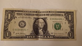 US One Dollar Note With Star Serial Number Average Circulated Condition - $19.99