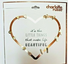 Charlotte Russe Earrings on Card 6 Pair Gold Tone Cross Bars Snowflakes Ribbons - £7.52 GBP