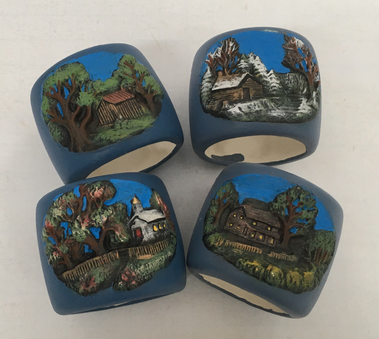 vintage hand painted pottery napkin holders rings blue with rural countr... - $19.80