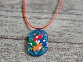 Autism Awareness Charm Bundle, including resin charm, necklace, mini fla... - $11.00
