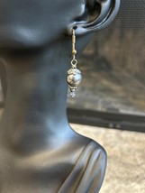 2 pairs of customers earrings - $221.43 MXN