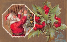 Rouge Suit Santa Suspendu Ornement Sur Tree-A Joyeux Noël ~1910 Carte Po... - $8.70
