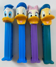 Vintage Lot of 4 Donald Daisy Duck Pez Dispensers - $19.79