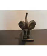 The African Tusker: Elephant Sculpture on Marble - $50.00