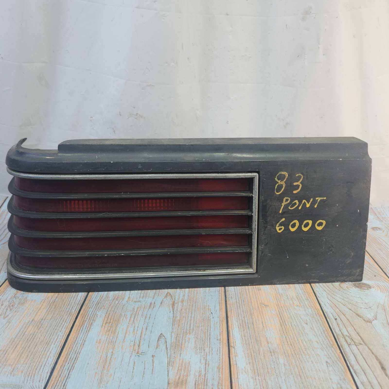 GM 16500342 Pontiac 1982-1983 6000 LH Driver Tail Light Assembly Dark Gr... - $40.47