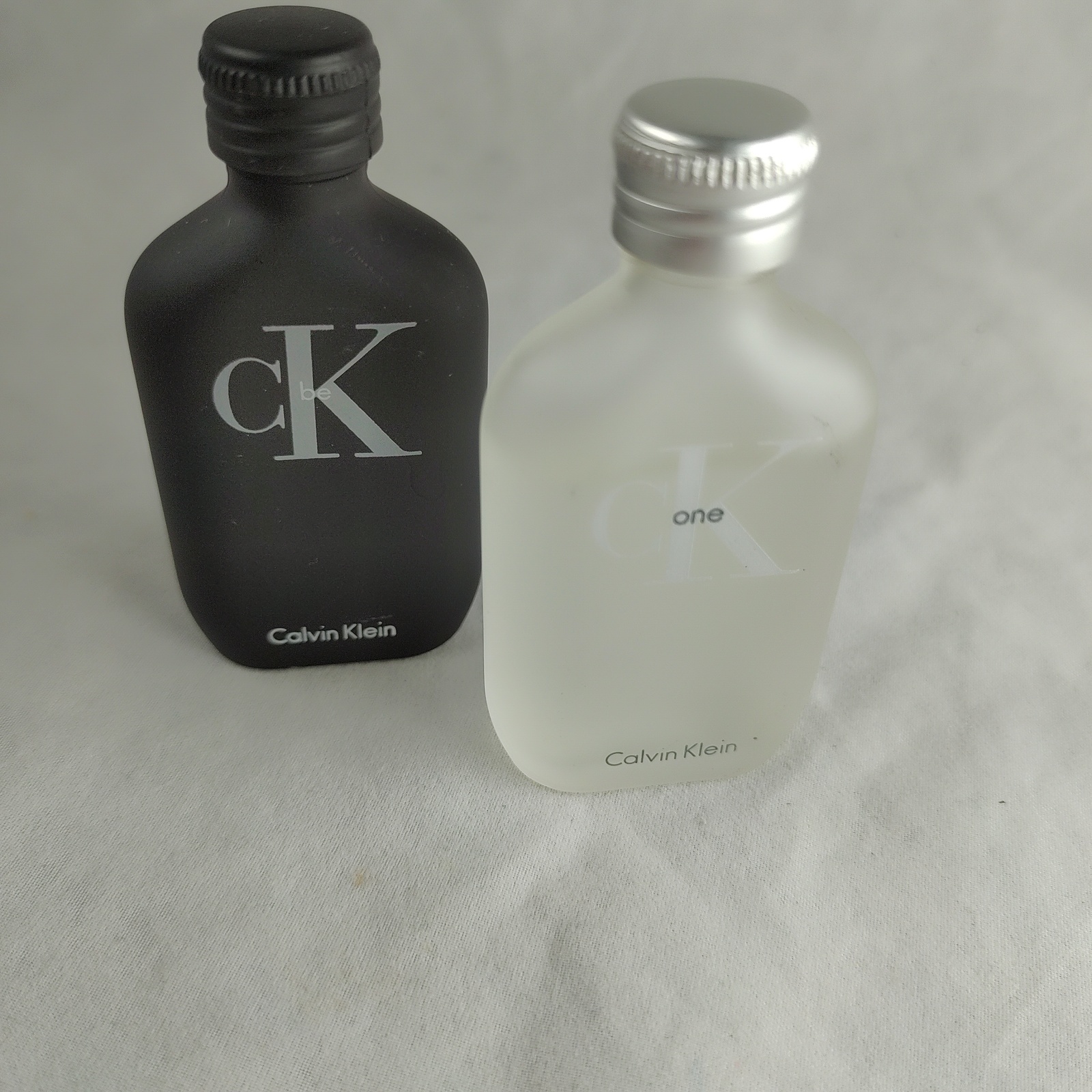 2 Mini Size Bottles Calvin Klein Unisex Colognes; One and Be Sealed .5 Oz Each  - $17.95