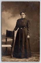 RPPC Victorian Woman Sad Face Dark Dress Studio Photo Postcard N30 - £9.37 GBP