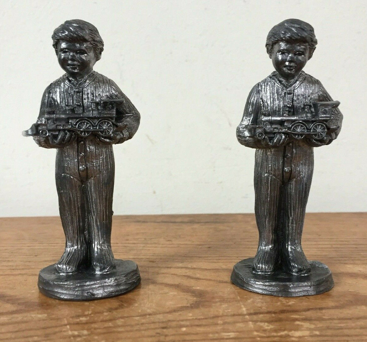 Primary image for Pair Vtg Michael Ricker Pewter Christmas Train Boys Figurines Handcrafted USA
