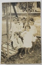 RPPC Sweet Children on Face to Face Swing Appears 5 Siblings c1915 Postcard R3 - £11.76 GBP