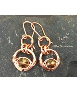 Handmade copper earrings: circle herringbone wire wrap amber Czech glass... - €25,67 EUR