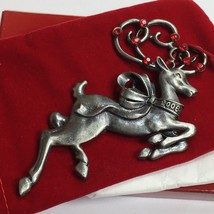 Pewter Christmas Reindeer Ornament w/red rhinestones 2006 Avon Pouch and... - $16.00