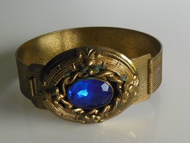 Vintage Hinged Brass Bracelet W/Blue Oval Stone - £52.24 GBP