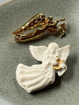 Lot of Cream Ceramic Angel w Harp &amp; Goldtone Flying Angel Blowing Horn Brooch - £8.82 GBP