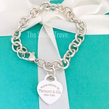 Please Return to Tiffany & Co Silver Heart Tag Charm Bracelet - $375.00