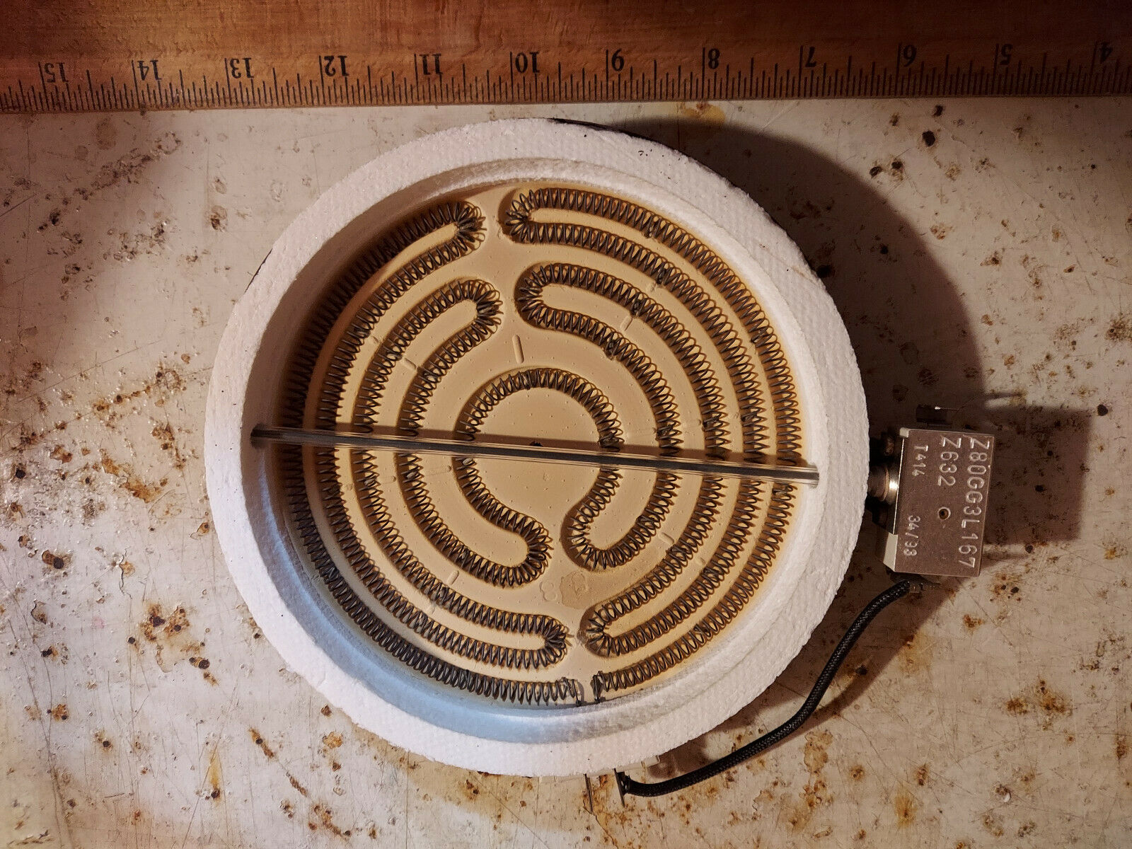Primary image for 21TT17 CERAMIC STOVE BURNER: 40 OHM, 6.5" DIAMETER, RUST ON SHELL, OTHERWISE GC