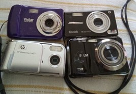 Lot Of 4 Small Cameras Vivitar Hp Kodak Fujfilm Not Tested - $29.70