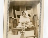 Cute Baby Wearing a Bonnet Sitting in a Rocking Chair Black and White Photo - $13.86