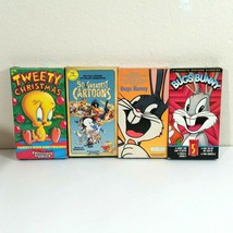 4 Children&#39;s Movies VHS Buggs Bunny Tweety Christmas Casper Woody Woodpe... - £13.95 GBP