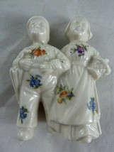 Vintage White Porcelain Dutch Couple with small floral design 3&quot; tall Pr... - $9.89