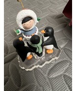 Hallmark 1998 Frosty Friends Ornament Eskimo Christmas Penguin cake topper - $21.22