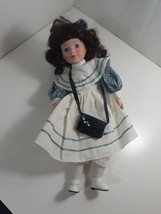 JC Penney Collector's Porcelain Girl Doll 15" gray Eyes  dark brown hair 1992 - $6.44