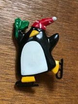 Vintage Hallmark Cards 1989 Plastic Skating Penguin with Red Stocking Hat Pin  - $8.59