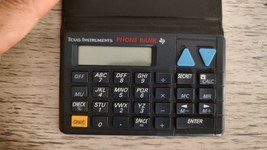 Texas Instruments Phone Bank Calculator I-0689 with Case - $17.35