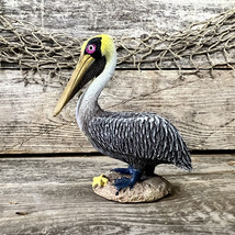 Miniature Brown Pelican On Beach Resin Statuette - £7.92 GBP